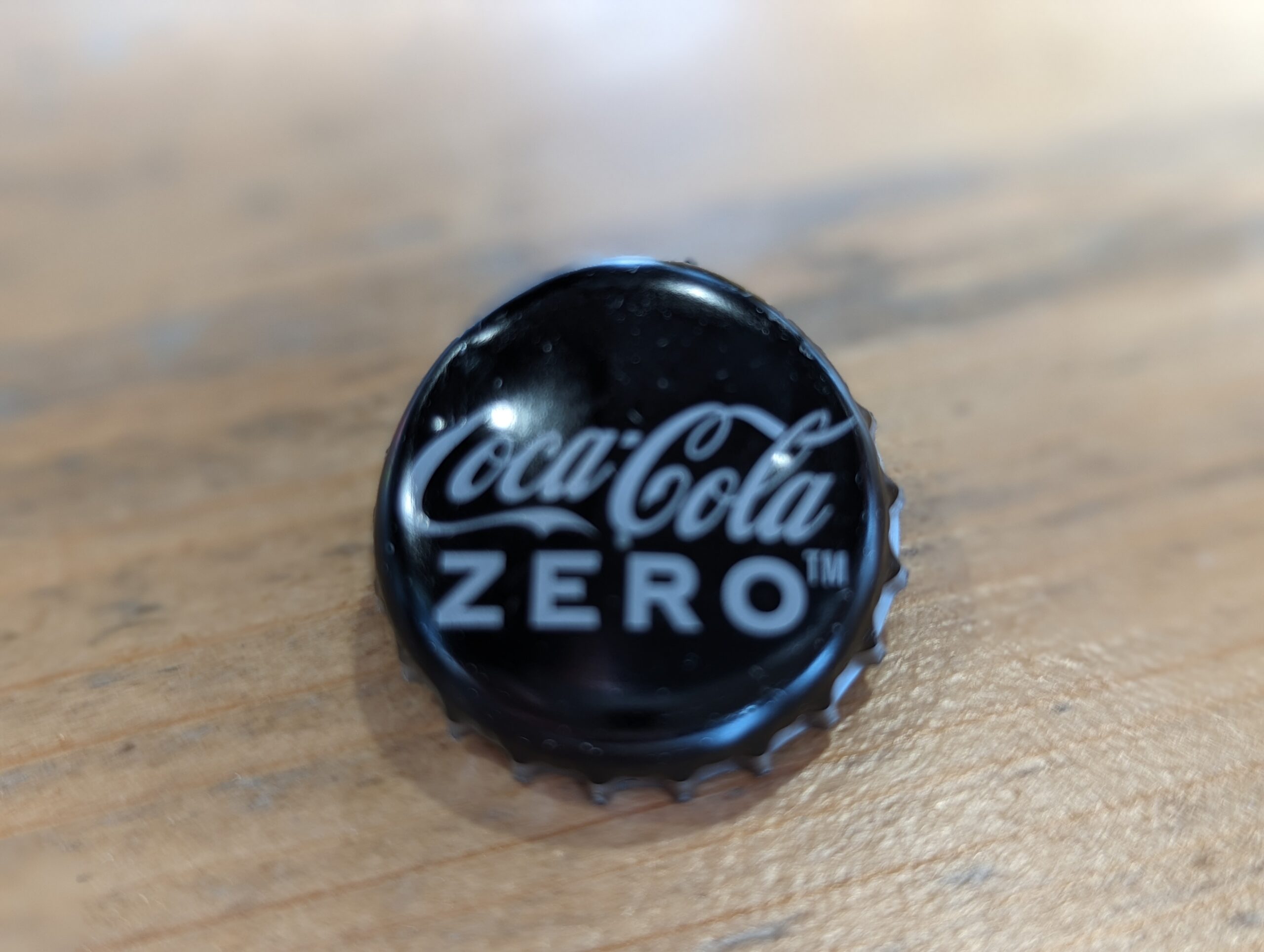 Chapa de botella de coke zero